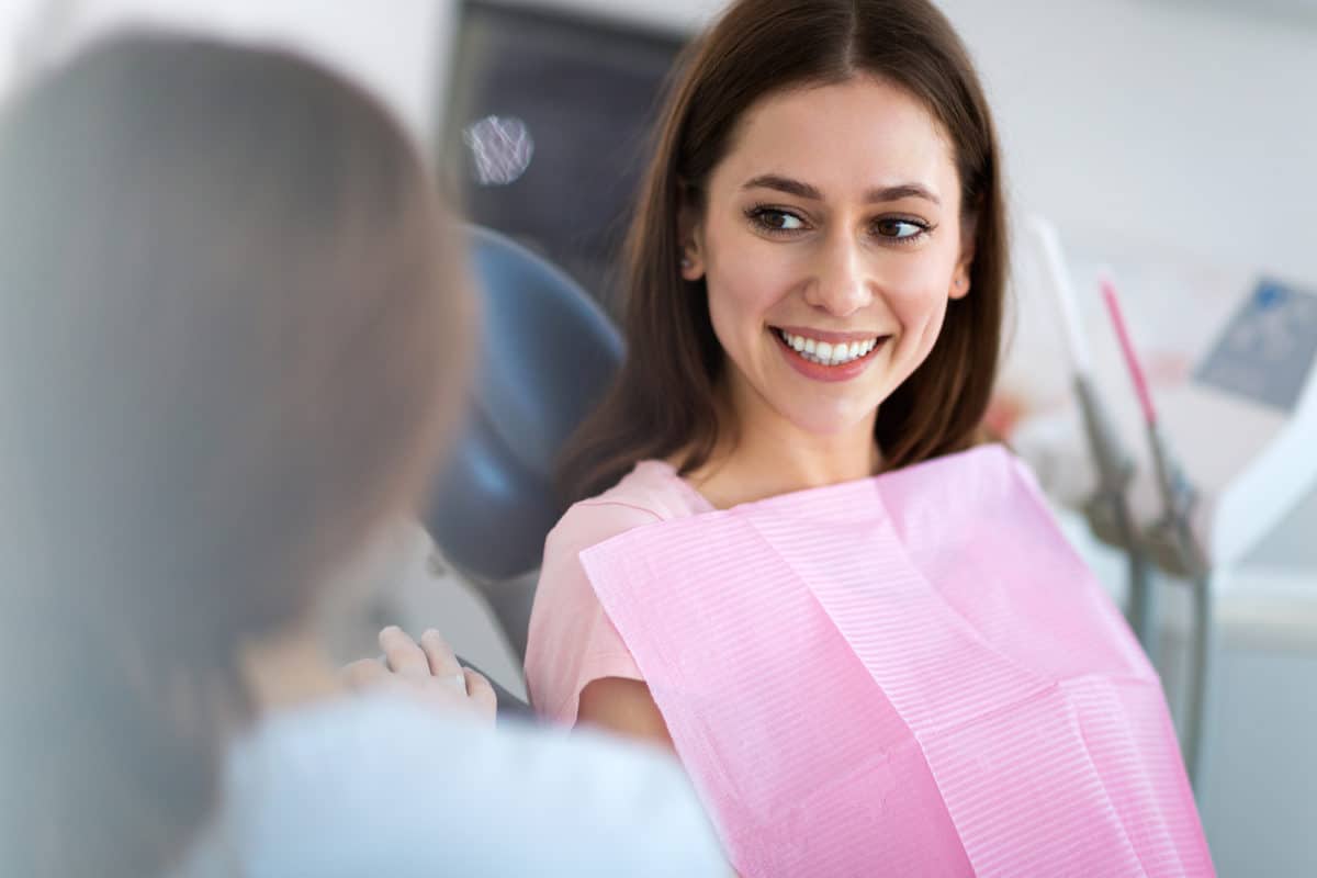 A patient smiling at the dentist | Sedation dentistry